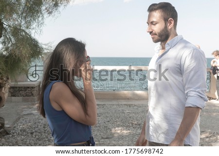 Similar – Image, Stock Photo Young couple having fun in a summer day