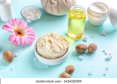 Shea butter with oil on color background