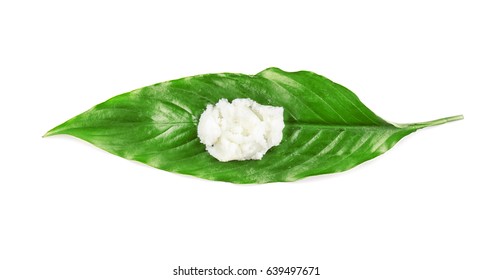 Shea Butter On Green Leaf On White Background