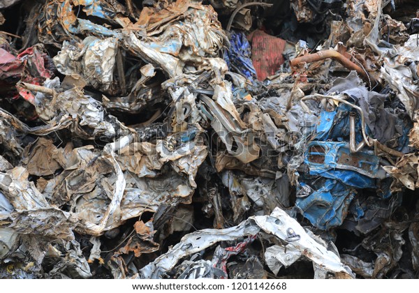 Shear scrap is\
cutting from metal plates and components, car body parts and\
similar light- to medium weight\
scrap.