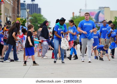 Sheboygan, Wisconsin - July 4th, 2022: Participants Of Freedom Fest Parade Handed Out Candy To Adults And Children Spectators.