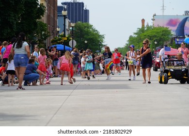 Sheboygan, Wisconsin - July 4th, 2022: Participants Of Freedom Fest Parade Handed Out Candy To Adults And Children Spectators.