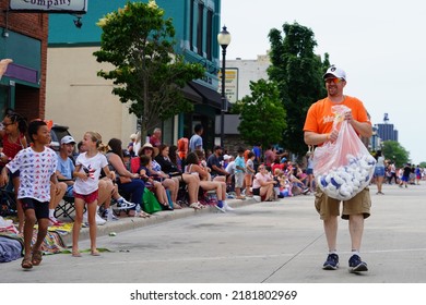 Sheboygan, Wisconsin - July 4th, 2022: Participants Of Freedom Fest Parade Handed Out Candy To Adults And Children Spectators.