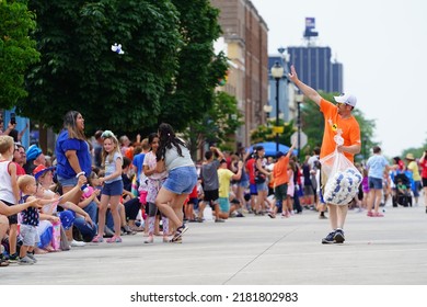 Sheboygan, Wisconsin - July 4th, 2022: Participants Of Freedom Fest Parade Handed Out Candy To Adults And Children Spectators.