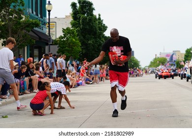 Sheboygan, Wisconsin - July 4th, 2022: Participants Of Freedom Fest Parade Handed Out Candy To Adults And Children Spectators.