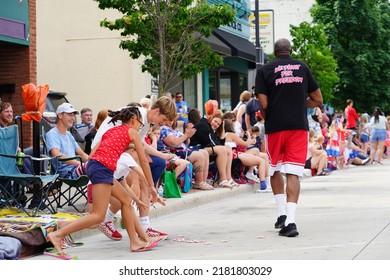 Sheboygan, Wisconsin - July 4th, 2022: Participants Of Freedom Fest Parade Handed Out Candy To Adults And Children Spectators.