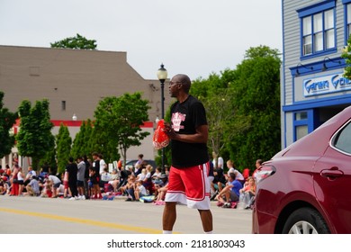 Sheboygan, Wisconsin - July 4th, 2022: Participants Of Freedom Fest Parade Handed Out Candy To Adults And Children Spectators.