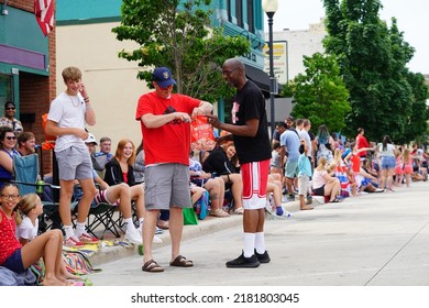 Sheboygan, Wisconsin - July 4th, 2022: Participants Of Freedom Fest Parade Handed Out Candy To Adults And Children Spectators.