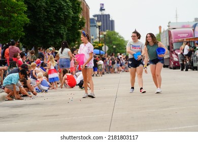 Sheboygan, Wisconsin - July 4th, 2022: Participants Of Freedom Fest Parade Handed Out Candy To Adults And Children Spectators.