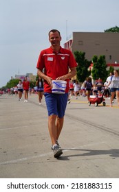 Sheboygan, Wisconsin - July 4th, 2022: Participants Of Freedom Fest Parade Handed Out Candy To Adults And Children Spectators.