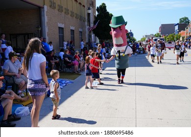 Sheboygan, Wisconsin USA - July 4th, 2019: Johnsonville Sausage Mascots Walked Around In Freedom Pride Parade Greeting Kids On The Side Of The Street.