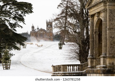 Sheep In A Snow Flurry In Front Of The Gothic Temple At Stowe