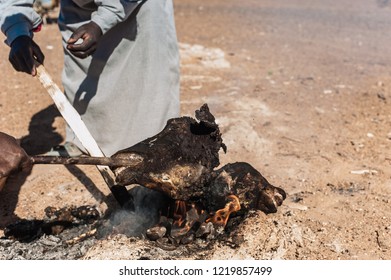 A Sheep's Head, Charred On A Fire, Sheep Head For Breakfast Or Lunch Is A Very Popular Dish In Morocco