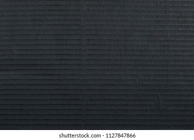 A Sheet Of Black Corrugated Cardboard 