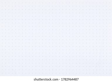 Sheet of blank dotted pale yellow notebook paper background. Extra large highly detailed image.