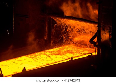 Sheet of hot metal on the conveyor belt - Powered by Shutterstock