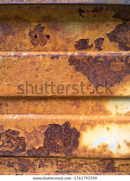 \
Sheet\
metal corrosion of old steel equipment. Rusty surface. Imperfection\
rust background. Damaged texture. Protection and painting plate.\
Professional paintwork concept. Brown backdrop.\
