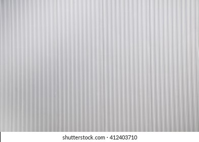 Sheet metal, corrugated wall building