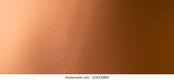 sheet metal painted a copper color. background or texture
