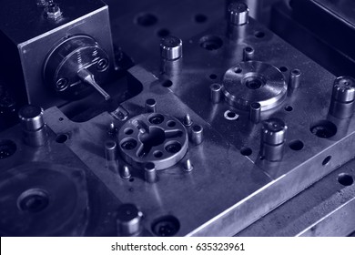 Sheet Metal Stamping Tool Die for Automotive Precision Parts on The Numerical Control Milling Machine Table. Tandem Stamping System. At a High Quality Technology Factory. Cyanotype Photography.