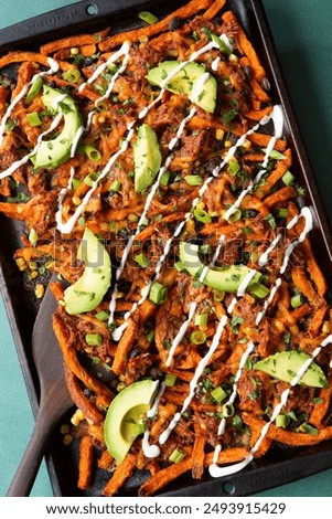 Similar – Image, Stock Photo Baked sweet potato with vegetable filling.