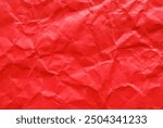 A sheet of red color wrinkled paper texture as background