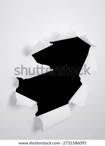 a sheet of torn paper , a template for the design of frames, a mockup