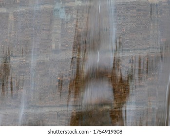 Sheet Of Water Running Down A Wall.