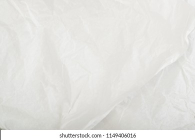 Sheet of White Thin Crumpled Craft Paper Background Top View. Wrinkled Grey Wrapping Paper Texture or Pattern