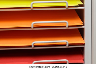 Sheets colored cardboard for designer creative works in the store. Close up. High quality photo