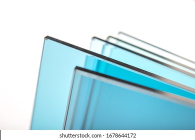 Sheets of Factory manufacturing tempered clear float glass panels cut to size - Shutterstock ID 1678644172
