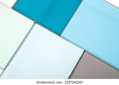 Sheets of Factory manufacturing tempered clear float glass panels cut to size - Shutterstock ID 2227241267