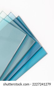 Sheets of Factory manufacturing tempered clear float glass panels cut to size - Shutterstock ID 2227241279
