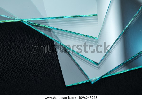 Sheets of Factory manufacturing tempered clear float\
glass panels cut to size