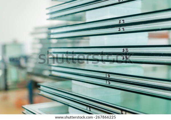 Sheets of Factory manufacturing tempered clear float
glass panels cut to size
