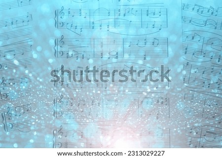 Sheets with music notes as background, top view. Bokeh and color tone effects