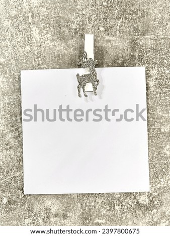 sheets for New Year's notes on a gray background