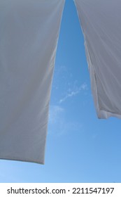 Sheets On The Clothesline With Sky Background