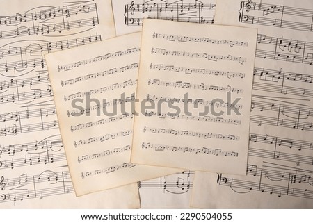 Sheets of paper with different notes as background, top view