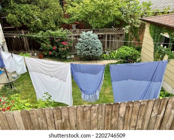 Sheets And Pillowcases On A Clothesline On Laundry Day