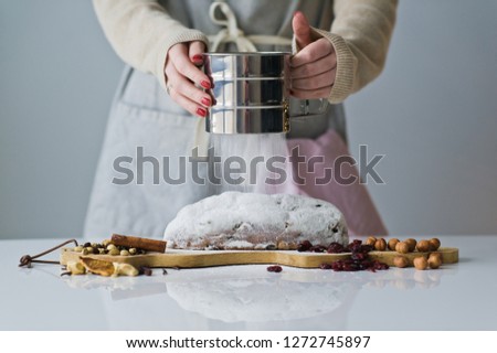 shef sprinkles easter cake with powdered sugar