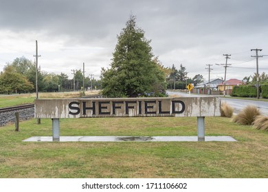 Sheffield, Canterbury / New Zealand, April 6 2019 :  Sheffield Village Name Sign Beside State Highway 73 