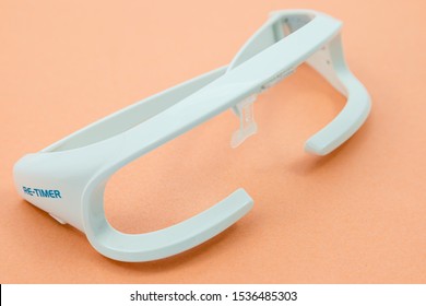 SHEFFIELD, UK – OCTOBER 12, 2019: Re-timer Blue-green Light Glasses A Non-medical Treatment For Insomnia, Sleeping Problems, Jet-lag And Seasonal Affective Disorder SAD