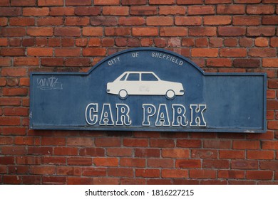 Sheffield UK - September 16 2020 Blue Retro Style Car Park Sign On Red Brick Wall