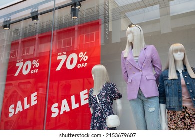 Sheffield, United Kingdom - May 07, 2022: New Look Fashion Retail Store Front Window With Mannequins And Sale Posters.