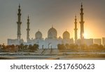 Sheikh Zayed Grand Mosque in Abu Dhabi at sunset timelapse, UAE. Evening view from Wahat Al Karama