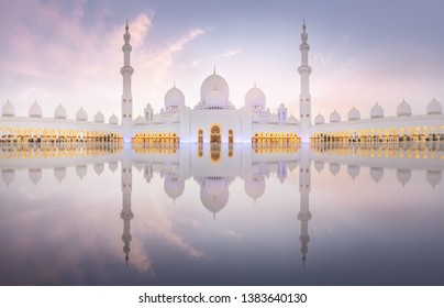 Sheikh Zayed Grand Mosque In Abu Dhabi During Pink Sunset. View Of Floral Pattern On The Floor Of Mosque.