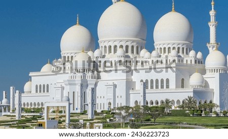 Sheikh Zayed Grand Mosque timelapse in Abu Dhabi, the capital city of United Arab Emirates. Blue sky at sunny day