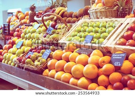 Shelf with fruits on a farm market, toned image