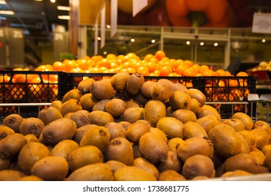 Shelf With Fruits In The Supermarket. Kiwifruit